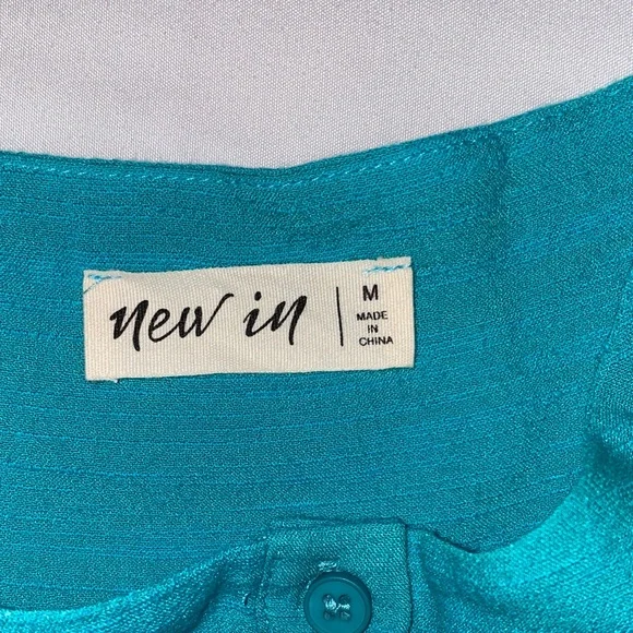 Boutique Top. Turquoise Ruffled Sleeve Button Full Down - Picture 2 of 3